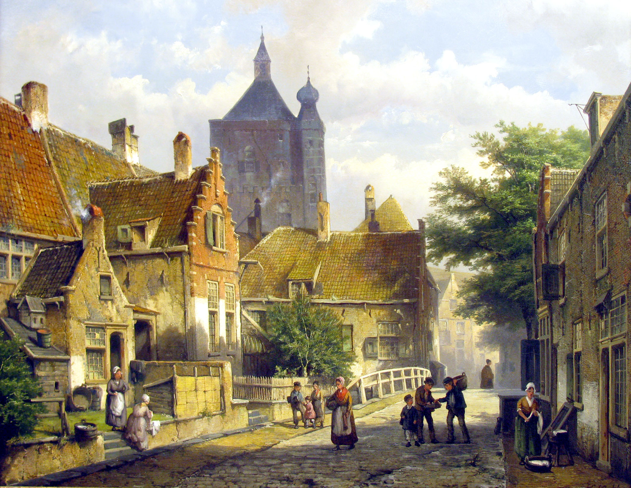 Villagers on a sunlit Dutch street